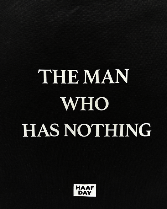THE MAN WHO HAS NOTHING canvas tote black