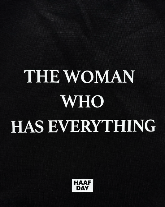 THE WOMAN WHO HAS EVERYTHING canvas tote black